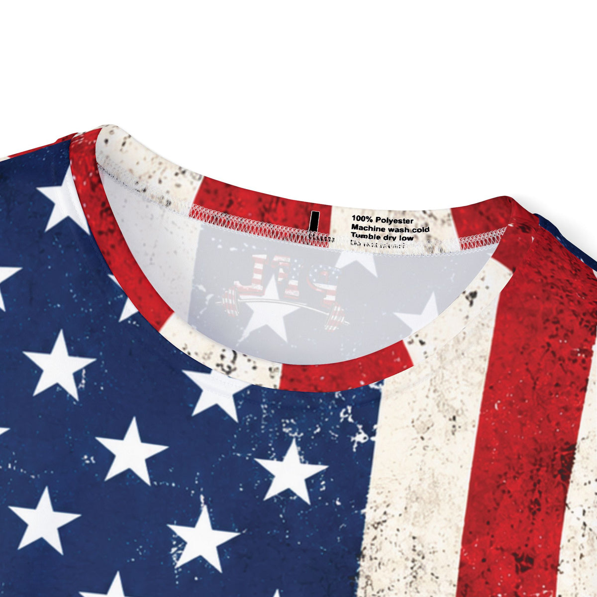 Close-up of a crewneck shirt featuring a distressed American flag print with, red, white, and blue colors, showing the inner neck label.