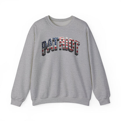 A heather gray crewneck sweatshirt featuring the word 'PATRIOT' printed across the chest in a 3D block font filled with an American flag pattern of red and white stripes and white stars on a blue background.
