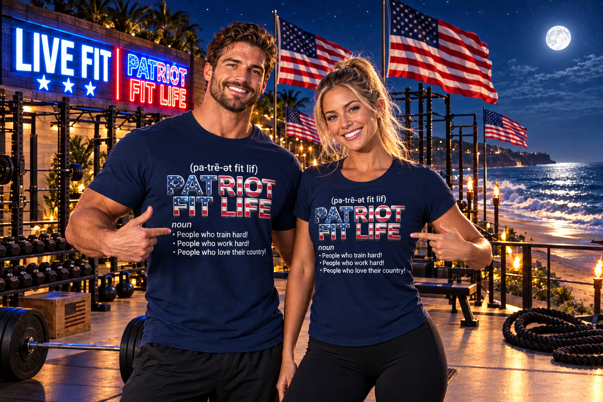 A man and a woman stand together in a gym at night wearing matching navy blue t-shirts with the slogan 'PATRIOT FIT LIFE' printed on the front. The background shows a lit-up CrossFit-style facility with American flags, weights, and ocean scenery at dusk.