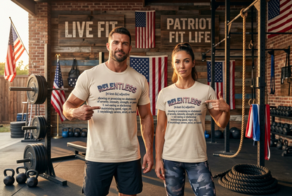 Two fit people standing in a rustic gym wearing matching beige graphic T-shirts with the RELENTLESS text with a dictionary-style definition below, printed on the front, posed in front of a brick wall with American flags and workout equipment.