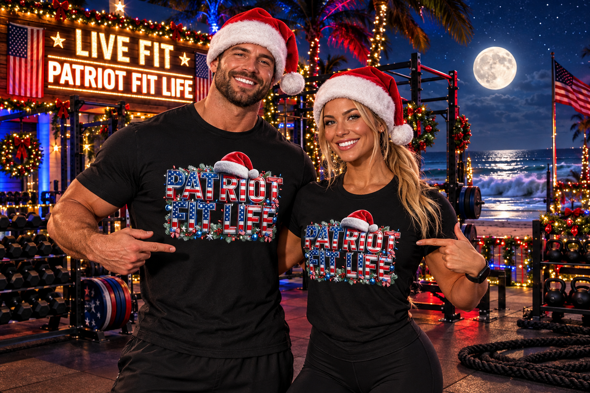 A man and a woman wearing black t-shirts with a festive 'Patriot Fit Life' graphic and matching Santa hats, posing in a decorated holiday gym setting at night.