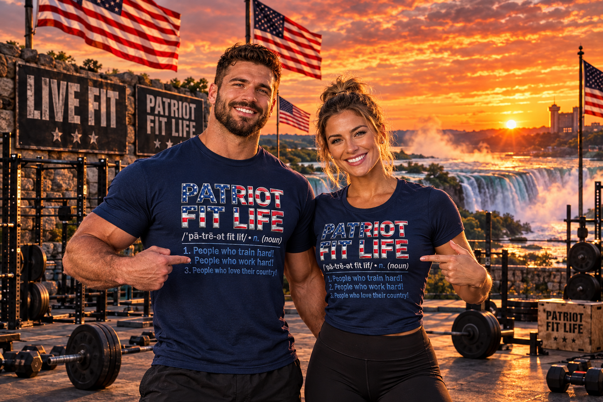 A man and a woman posing in a gym setting at sunset, both wearing matching navy blue t-shirts with 'PATRIOT FIT LIFE' printed on the front. The background features an outdoor workout area with weight equipment, American flags, and a scenic Niagara Falls at sunset.