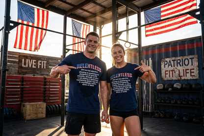 A man and a woman standing in a gym under American flags, both wearing matching navy blue t-shirts with white text that reads 'RELENTLESS' and a patriotic slogan below it.