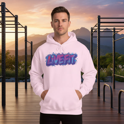 Person wearing a pink hoodie with a 'LIVE FIT' design in a gym setting.