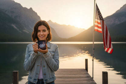 A woman holding a mug with an American flag backdrop with the text "This Is The Turning Point!" in front of a scenic lake and mountains.