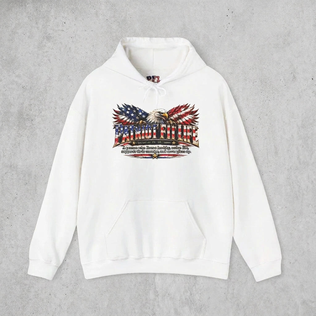 A white pullover hoodie featuring a patriotic graphic on the chest with an eagle, American flag elements, and Patriot Fit Life dictionary-style definition text, displayed against a clean solid white background.