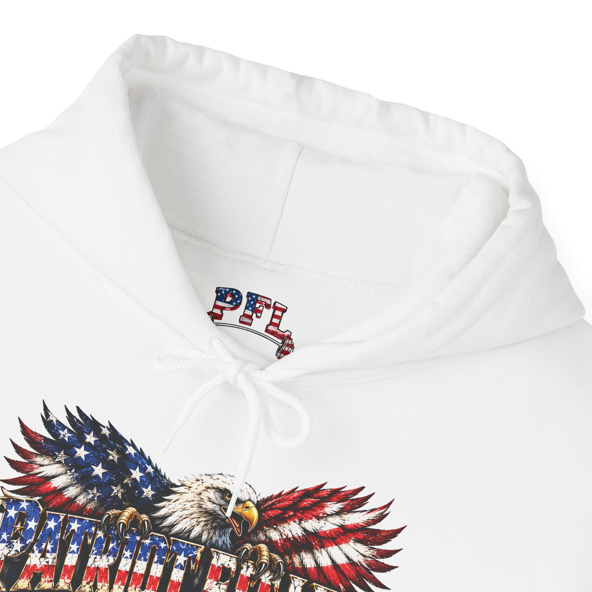 Close-up of a white pullover hoodie showing the inside neck area with a red, white, and blue 'PFL' logo (Patriot Fit Life) and a large patriotic eagle graphic with American flag patterned wings across the lower front.