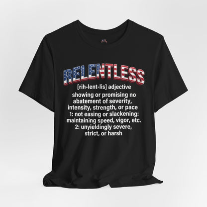 A black short-sleeve graphic T-shirt displayed against a light gray background. The shirt features a large graphic on the chest with the word 'RELENTLESS' in an American flag pattern, followed by a dictionary definition printed in white text.