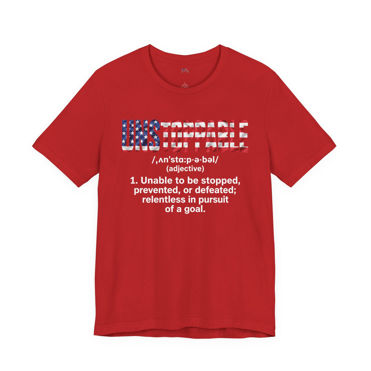 A red short-sleeve crewneck t-shirt featuring a white graphic print on the front. The graphic displays the word 'UNSTOPPABLE' stylized with the American flag pattern, followed by the dictionary definition of 'unstoppable' printed in white text below.