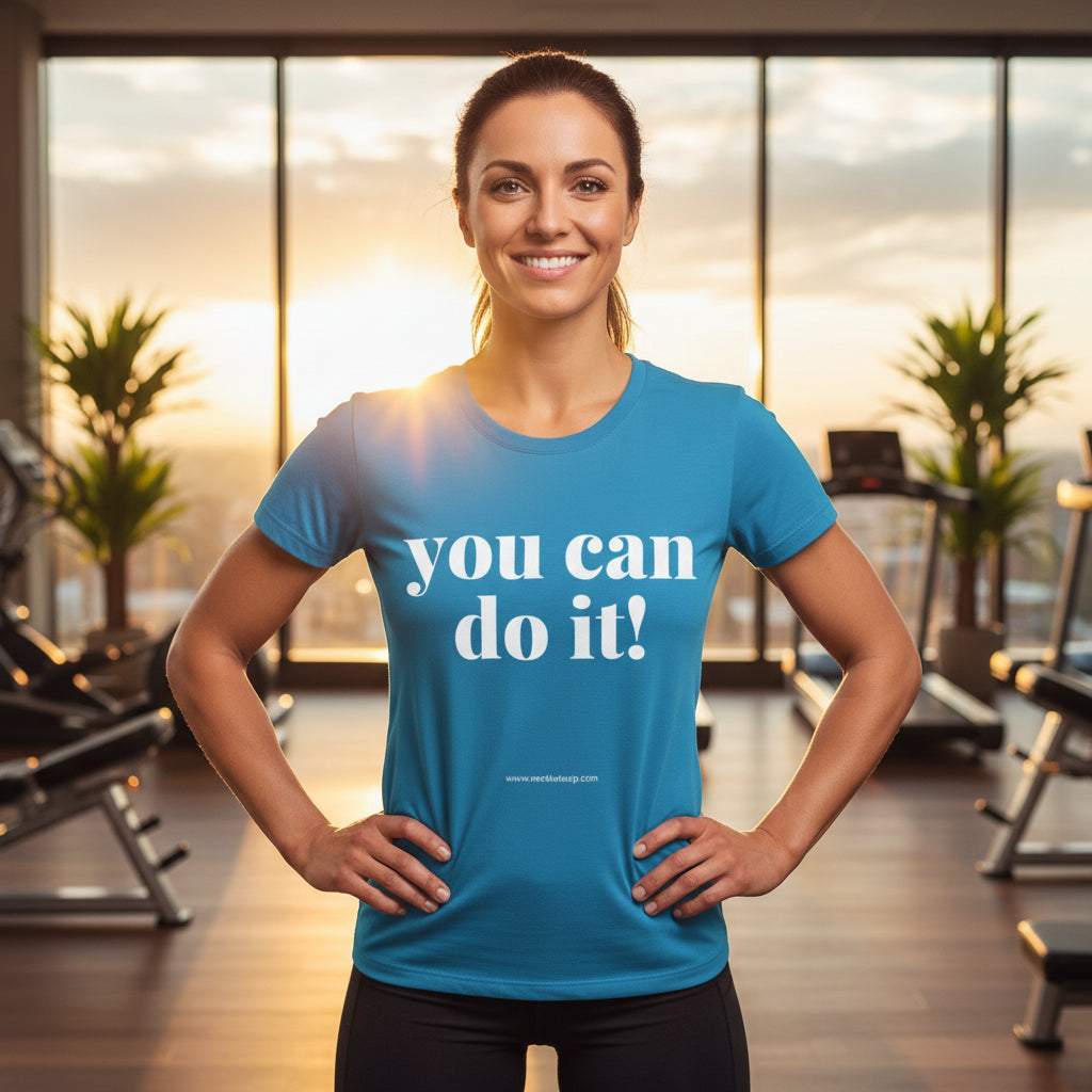 Blue t-shirt with you can do it!  text up against a scenic gym backdrop