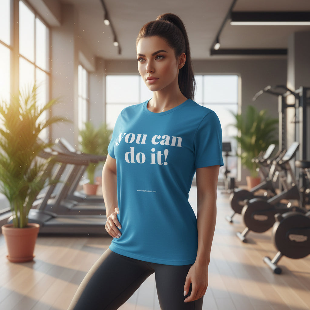 Blue t-shirt with you can do it! text up against a gym background